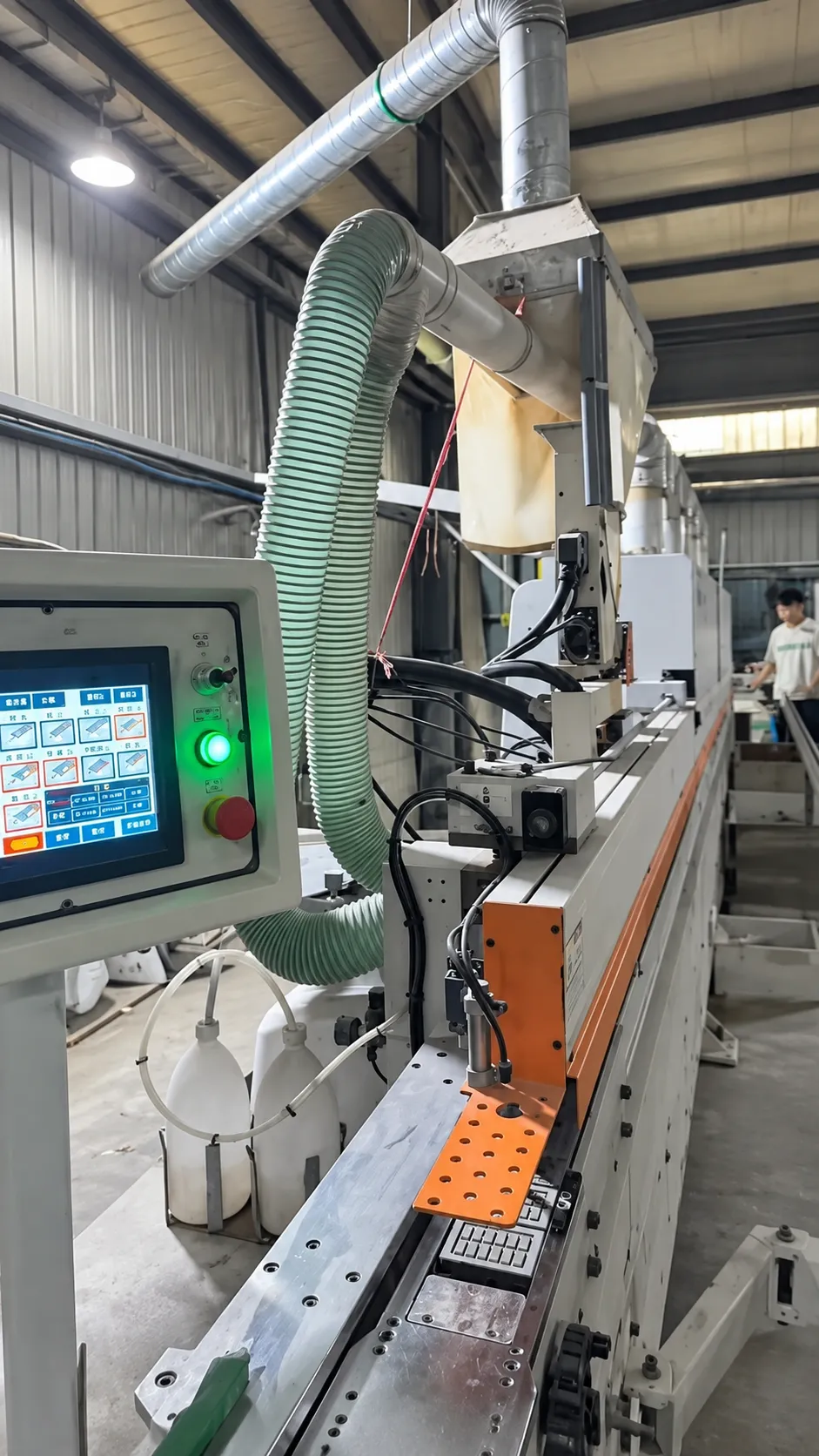 Production equipment being checked inside a working factory in China.